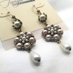Modern vintage gold toned Dangle Flux pearl flower fish Hook earrings.
